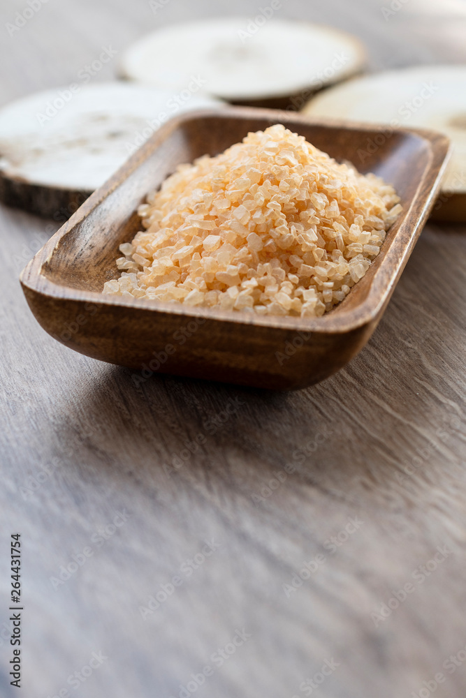 Spa sea salt in wooden bowl closeup Spa sea salt in wooden bowl closeup