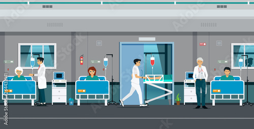 Total patient room with doctors and male nurses.