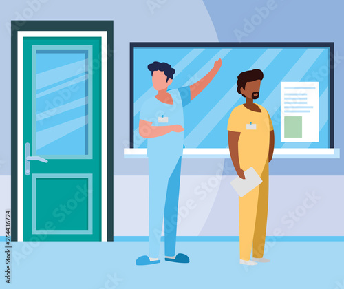 interracial male medicine workers in hospital reception