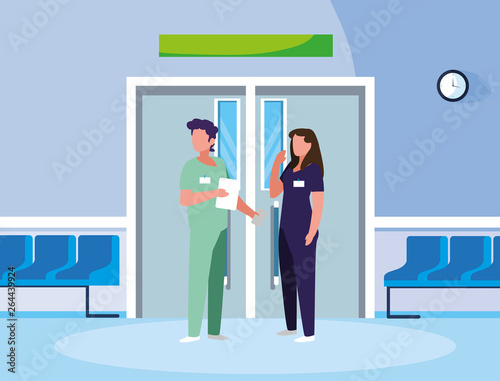 couple medicine workers in elevator door
