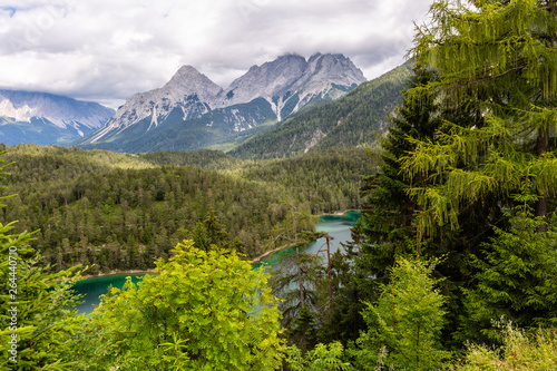 Beautiful landscape with montains and the lake in cloudy day © sokko_natalia