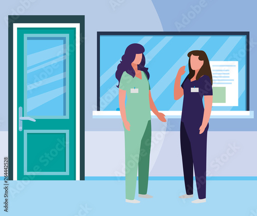 female medicine workers in hospital reception © djvstock