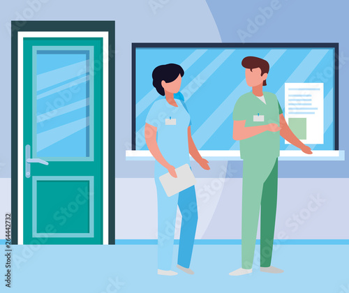 couple medicine workers in hospital reception © djvstock