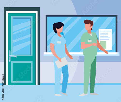 couple medicine workers in hospital reception