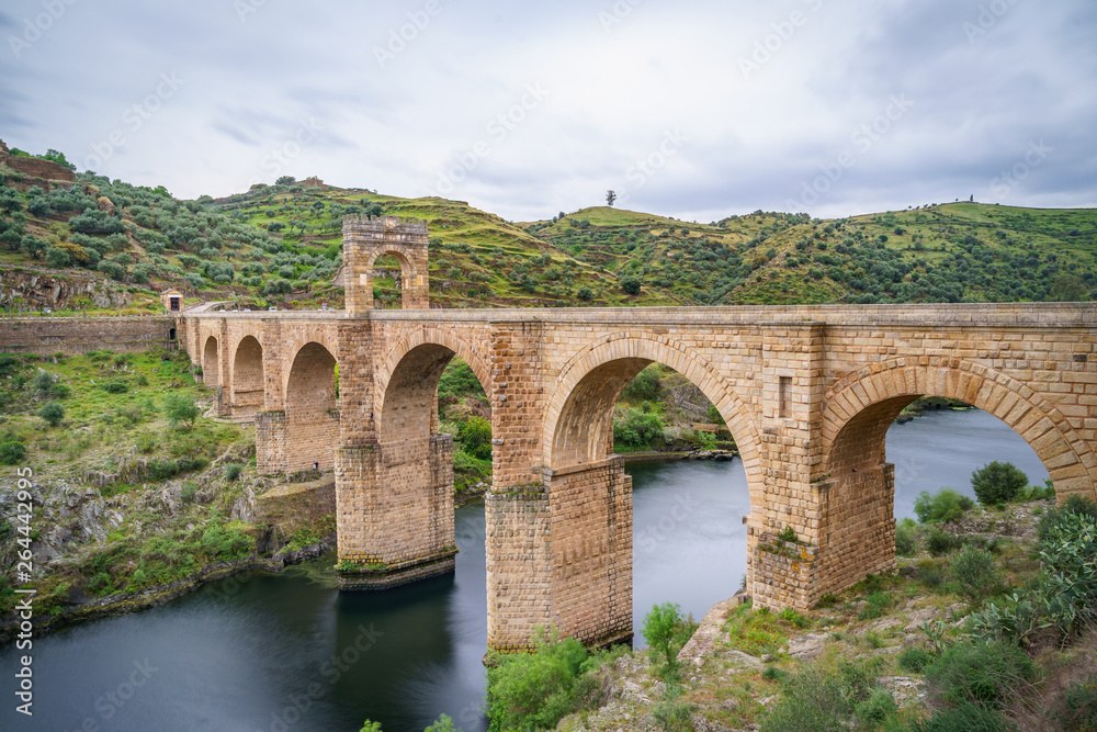 The Alcantara Bridge also known as Trajan Bridge at Alcantara is a Roman bridge at Alcantara, in Extremadura, Spain. Slow shutter speed shot.
