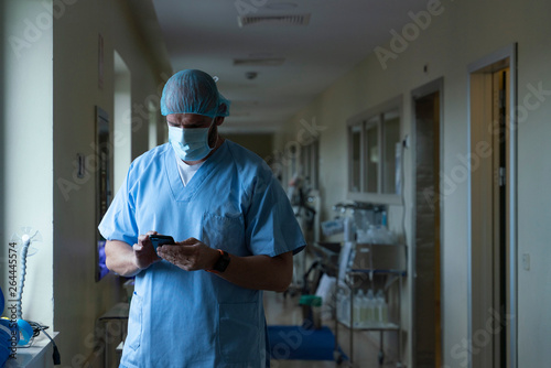 Doctor using mobile in hospital. Medical concept