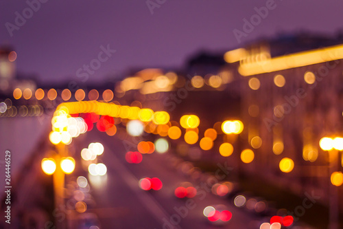 Abstract artistic photo  blurry cityscape with streetlights