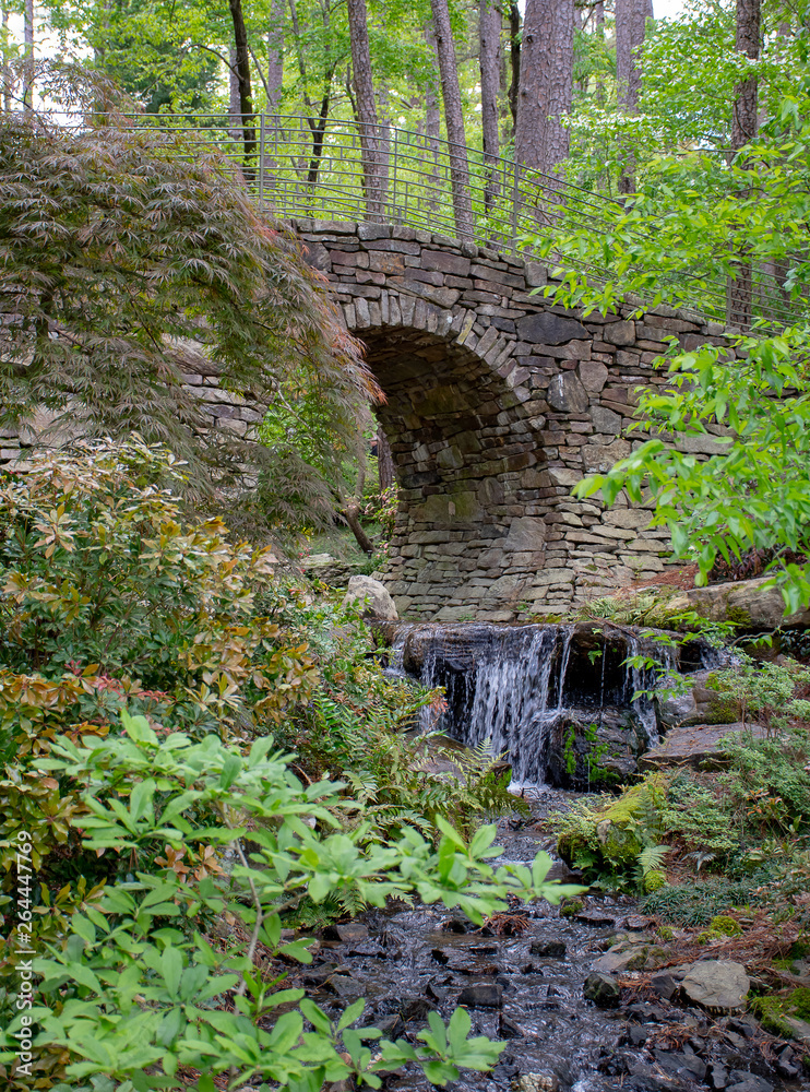 Stone bridge with a stream in a forest in the Ozark mountains Arkansas Stone bridge with a stream in a forest in the Ozark mountains Arkansas
