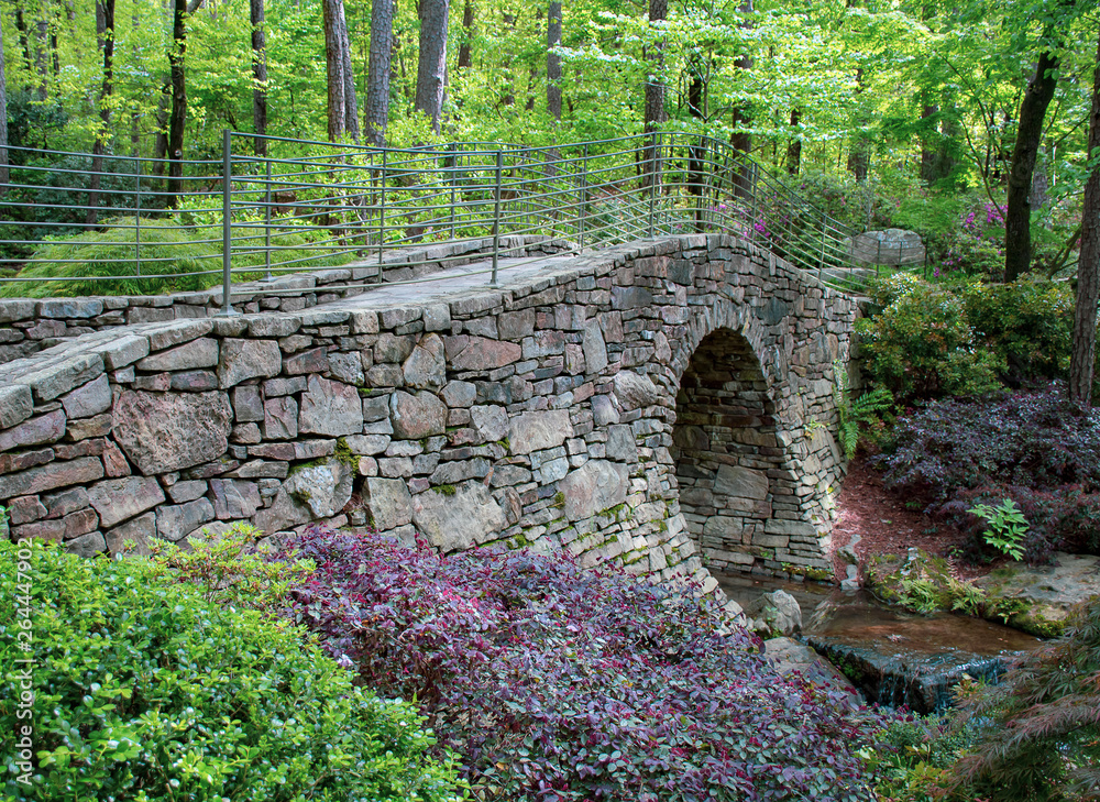 Stone bridge with a stream in a forest in the Ozark mountains Arkansas Stone bridge with a stream in a forest in the Ozark mountains Arkansas