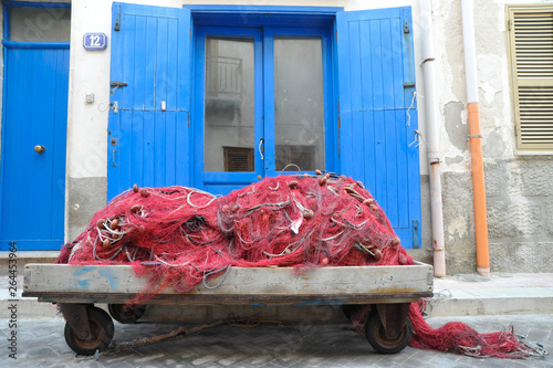 Fisherman's net:  Marettimo, one of Sicily's Aegadian Islands, where the net for fishing at sea, is used by fishermen. photo