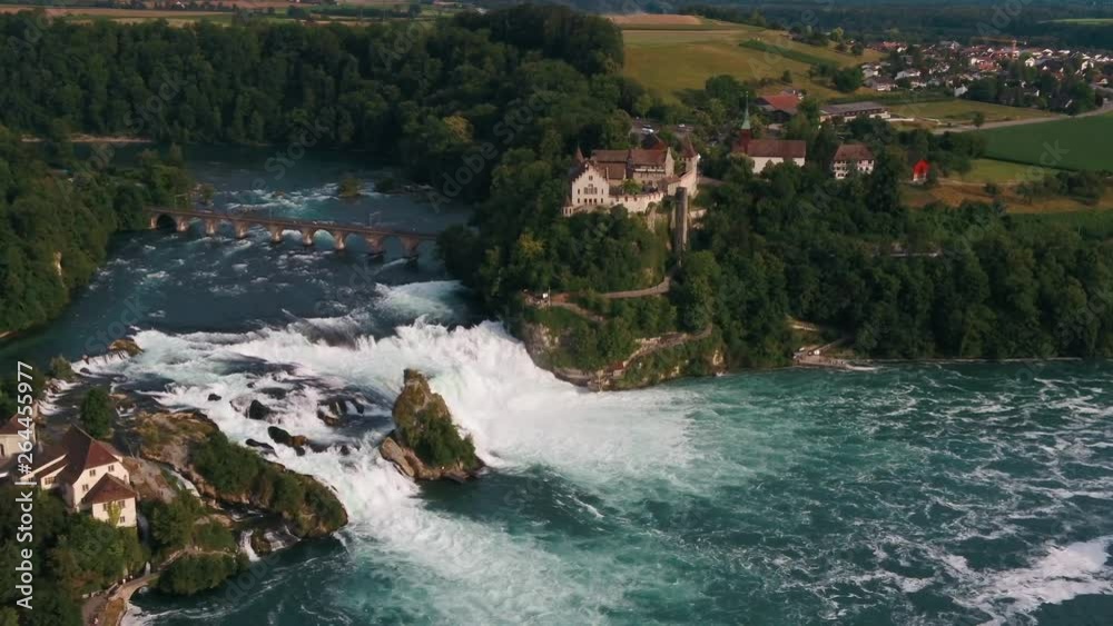 Europe's largest waterfall - Rhine Falls Schaffhausen. By ship u can reach castles, the Falls Basin and even the rock in of the waterfall.
Drone shot from far away with the castle. Europe's largest waterfall - Rhine Falls Schaffhausen. By ship u can reach castles, the Falls Basin and even the rock in of the waterfall.
Drone shot from far away with the castle.
