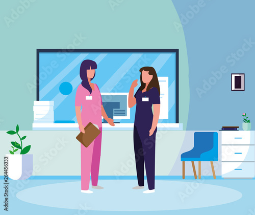 female medicine workers in hospital reception