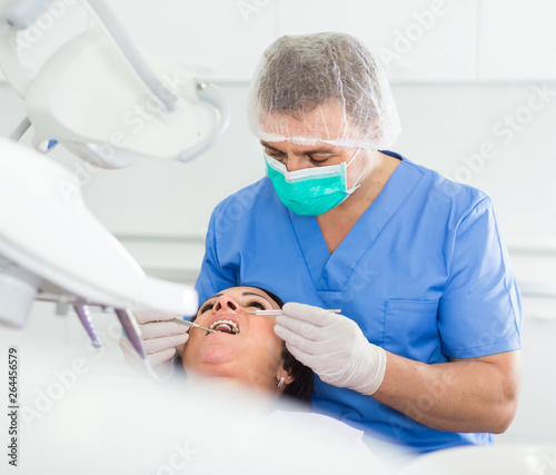 dentist professional filling teeth