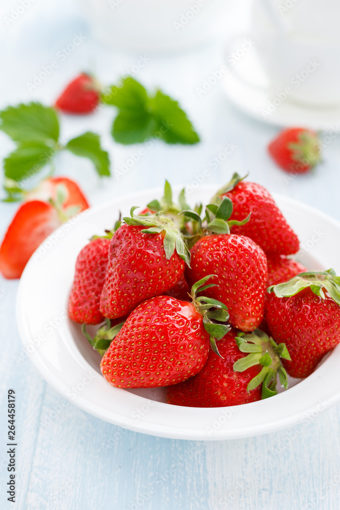 Fresh strawberry in bowl on table Fresh strawberry in bowl on table