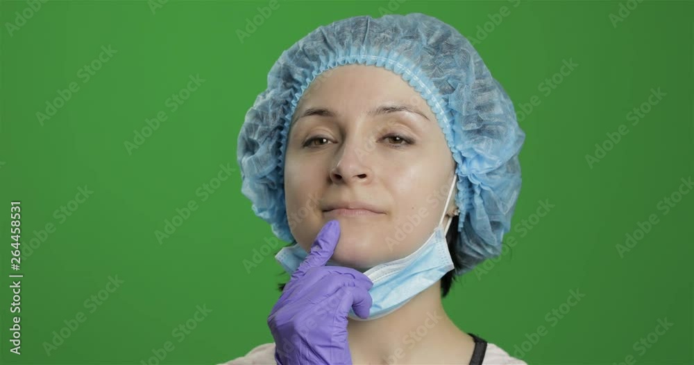 Young doctor is thinking. Adult female medical worker searching a right solution Young doctor is thinking. Adult female medical worker searching a right solution
