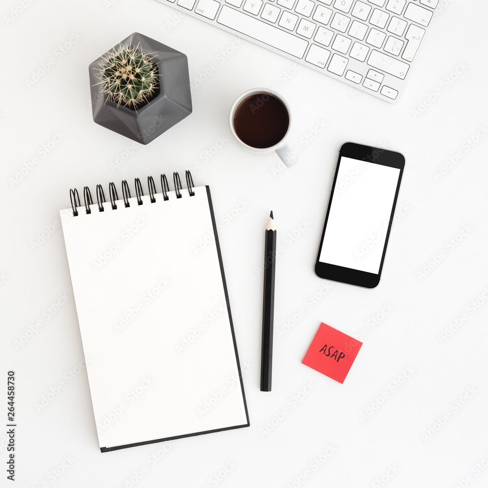 Mobile mockup, notebook, coffee and cactus on white office desk. Flat lay. Mobile mockup, notebook, coffee and cactus on white office desk. Flat lay.