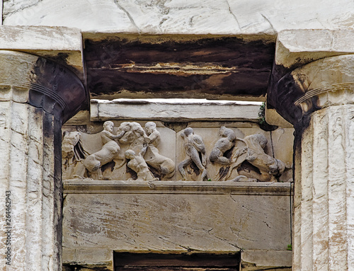 Detail of the temple of Hephaestus in Athens, Greece. Columns framing pediment scene.