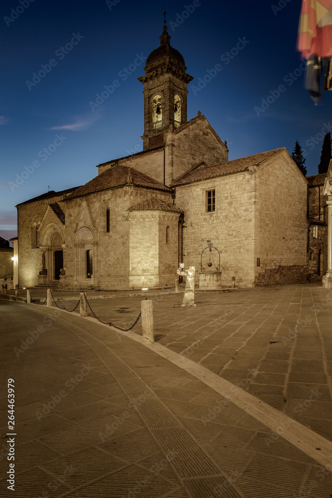 Colegiata in San Quirico dOrcia nightscape. Siena Province, Tuscany, Italy.