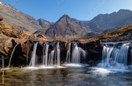 Fototapeta Naklejka Na Ścianę i Meble -  Fairy Pools, Isle of Skye. Cuillin Ridge in the background
