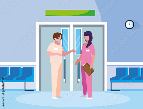 couple medicine workers in elevator door