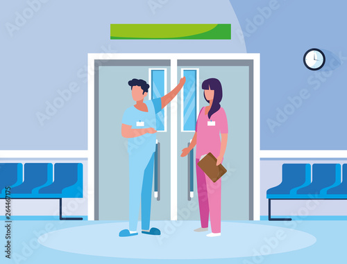 couple medicine workers in elevator door