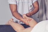 Medical treatment massage procedure in a spa salon.