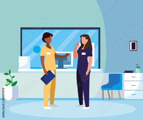 interracial female medicine workers in hospital reception