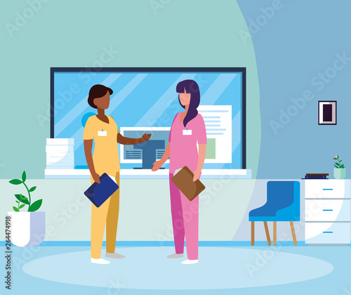 interracial female medicine workers in hospital reception