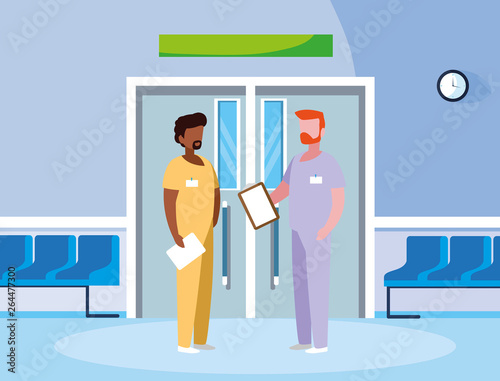 interracial male medicine workers in elevator door