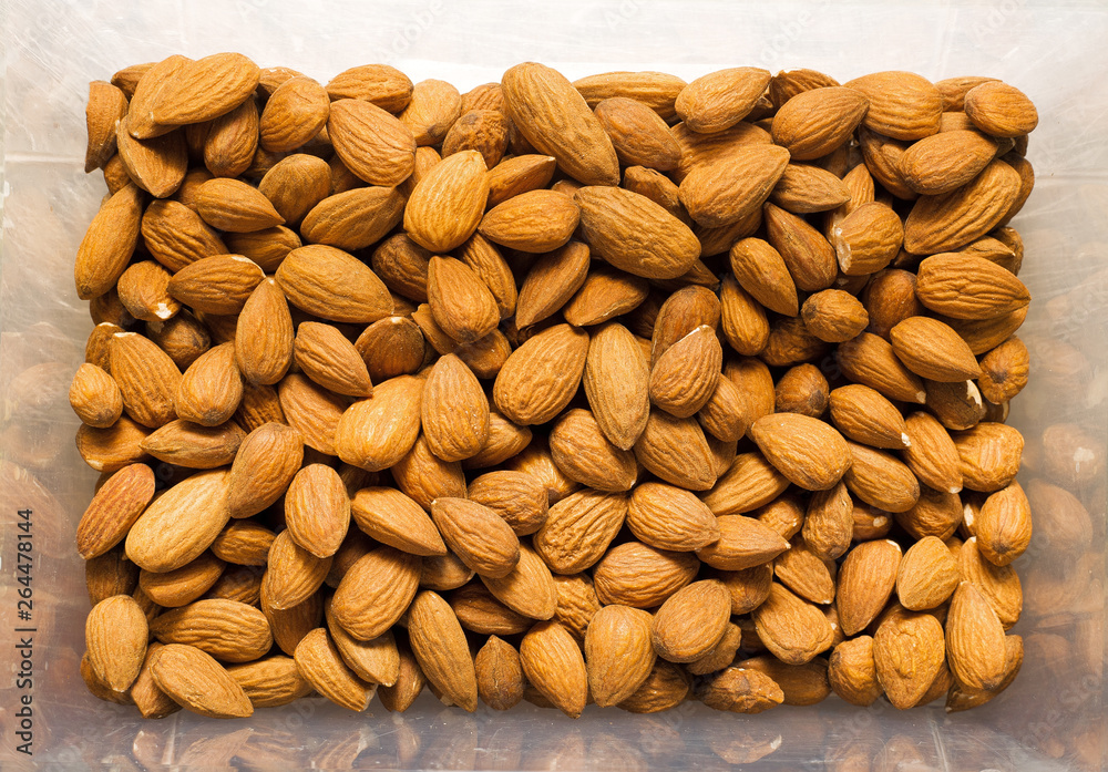 almond. fried. lots of almonds. nuts are a natural product. healthy food.