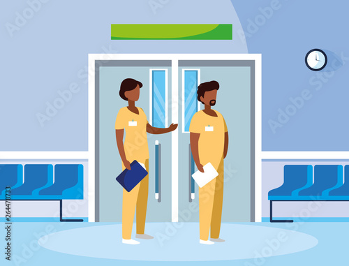 afro couple medicine workers in elevator door