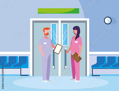 couple medicine workers in elevator door