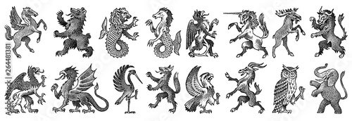 Animals for Heraldry in vintage style. Engraved coat of arms with birds, mythical creatures, fish, dragon, unicorn, lion. Medieval Emblems and the logo of the fantasy kingdom. photo