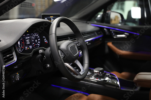 Driver's seat of the car. Sport car interior. steering wheel, shift lever and dashboard photo
