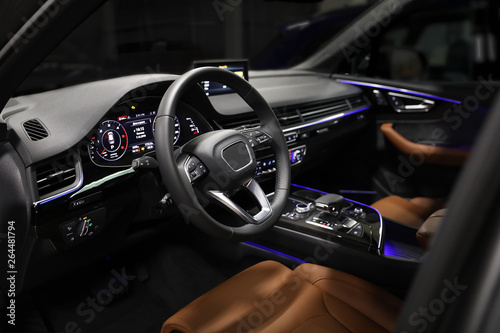 Driver's seat of the car. Sport car interior. steering wheel, shift lever and dashboard © pikatese