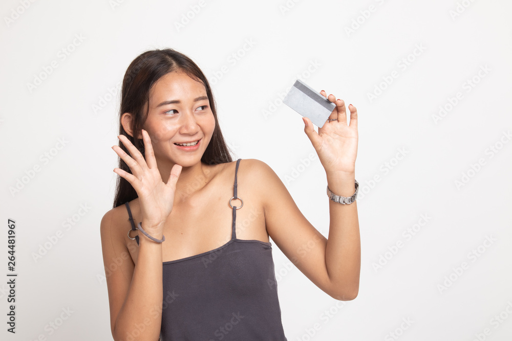 Young Asian woman happy with  blank card.