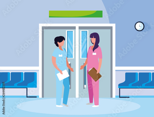 female medicine workers in elevator door