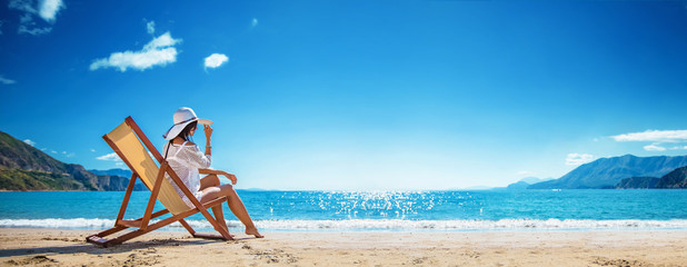 Woman Enjoying Sunbathing at Beach