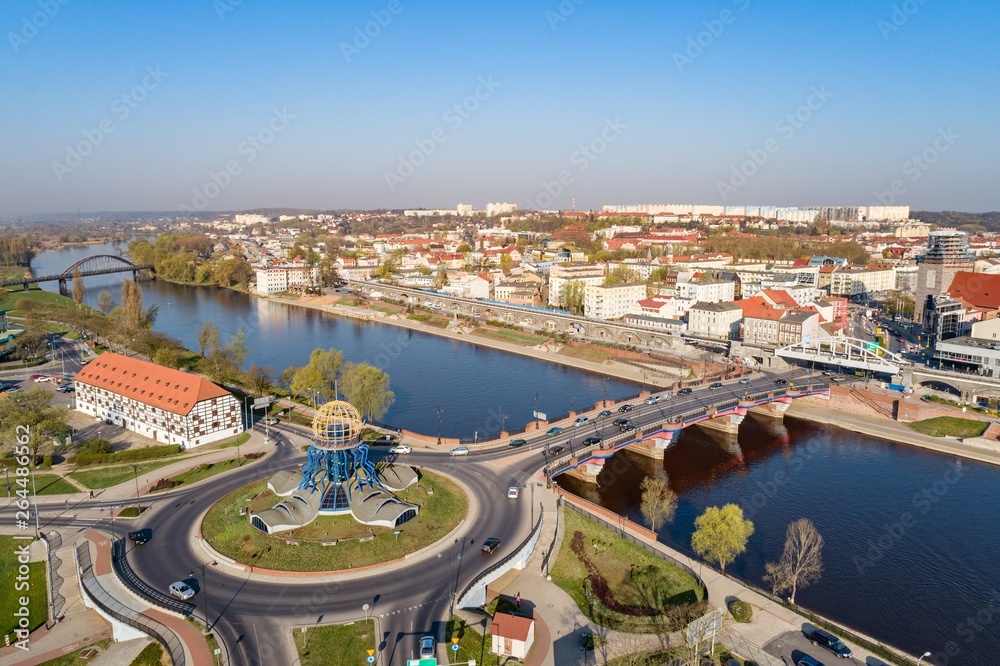 Aerial drone view on roundabout in Gorzow Wielkopolski and Warta river - obrazy, fototapety, plakaty 