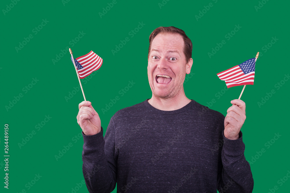 Male waving American flags excited smile expression on green screen background Male waving American flags excited smile expression on green screen background