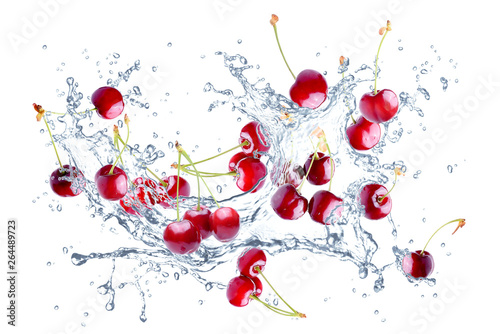 splash of water and cherries isolated on white background