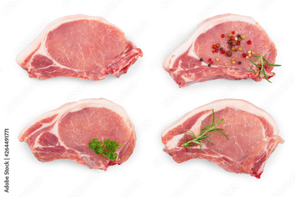 sliced raw pork meat with parsley rosemary and peppercorn isolated on white background. Set or collection. Top view. Flat lay sliced raw pork meat with parsley rosemary and peppercorn isolated on white background. Set or collection. Top view. Flat lay