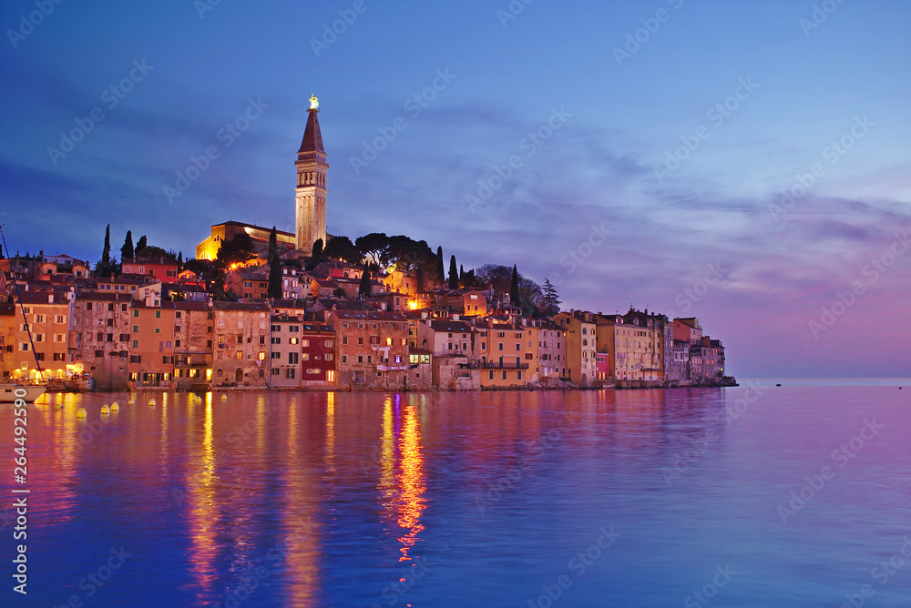 Rovinj old Town with the Cathedral of St. Euphemia in the blue hour at night