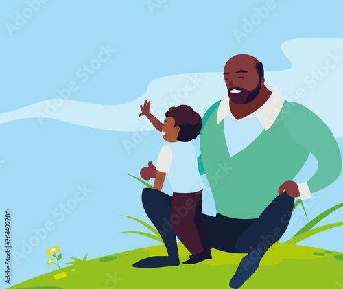 black father with son in the field