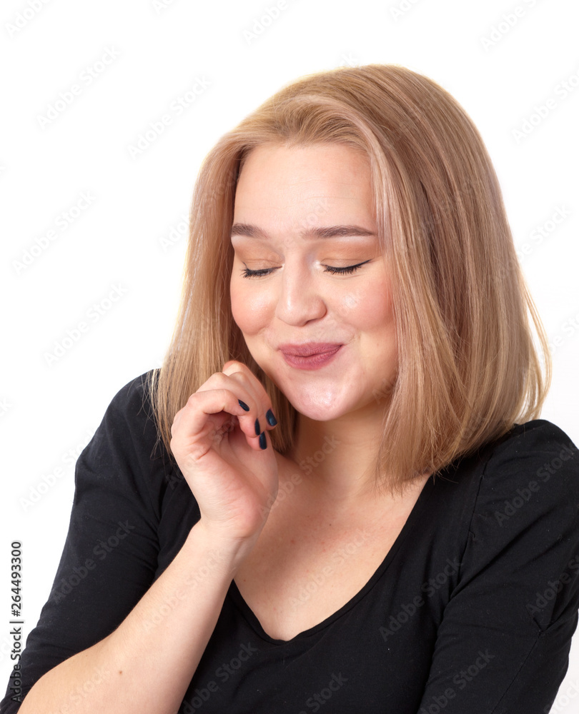 Young blonde woman smiling shyly portrait on white background Young blonde woman smiling shyly portrait on white background
