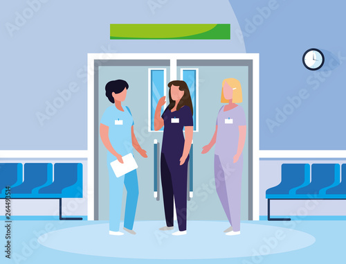 female medicine workers in elevator door
