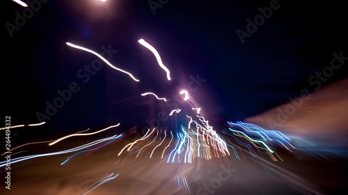 Fast car trip time lapse on the highway by night seen from the car