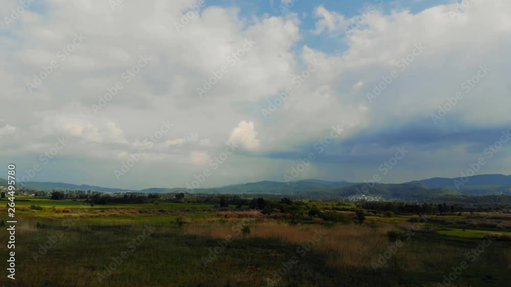 An aerial view from lush Aegean marshes and fields that surround them. Shot in Akyaka (Gulf of Gokova, Aegean Sea) on a colorful spring afternoon.. An aerial view from lush Aegean marshes and fields that surround them. Shot in Akyaka (Gulf of Gokova, Aegean Sea) on a colorful spring afternoon..