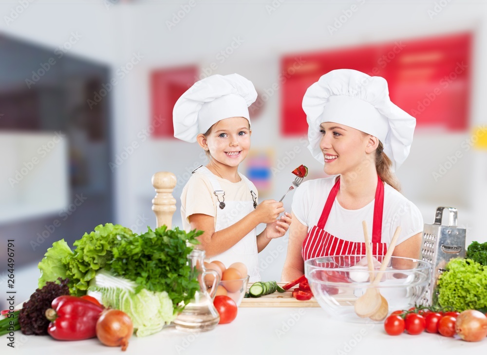 Portrait of adorable little girl preparing healthy food at kitchen Portrait of adorable little girl preparing healthy food at kitchen
