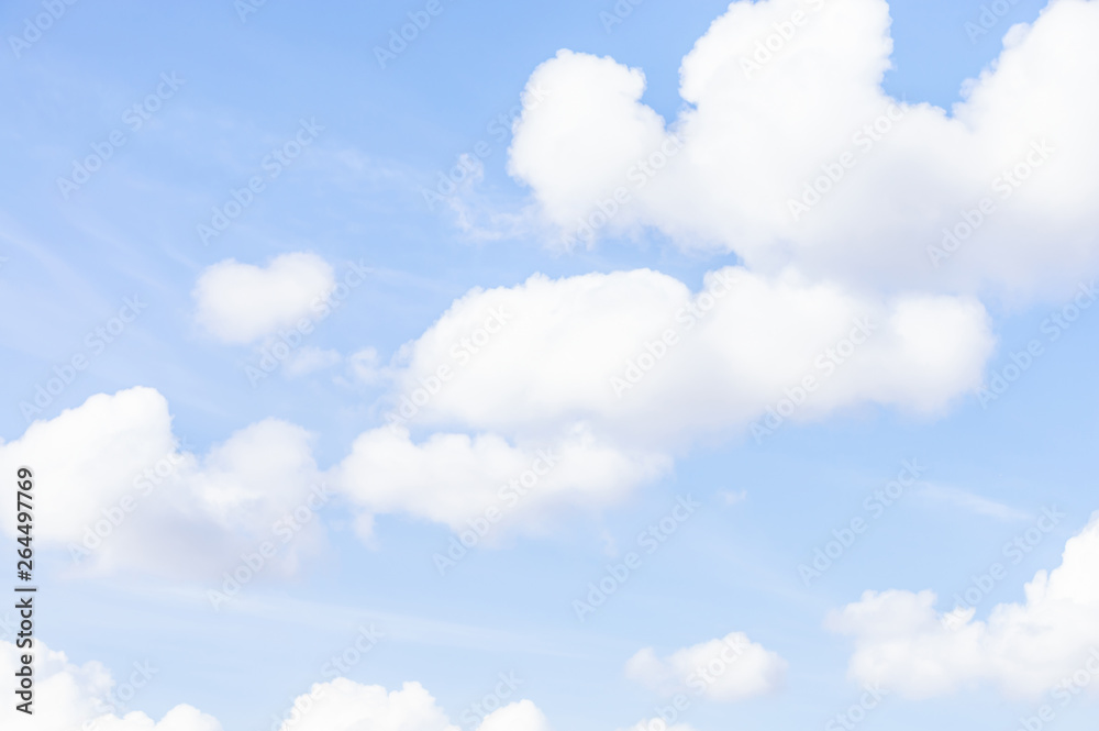 Blue sky and soft white clouds. Natural cloudscape background, texture. Copy space.
